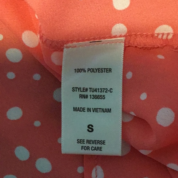 Coral colored white polka-dotted blouse with button front and tie closure. - Picture 4 of 5